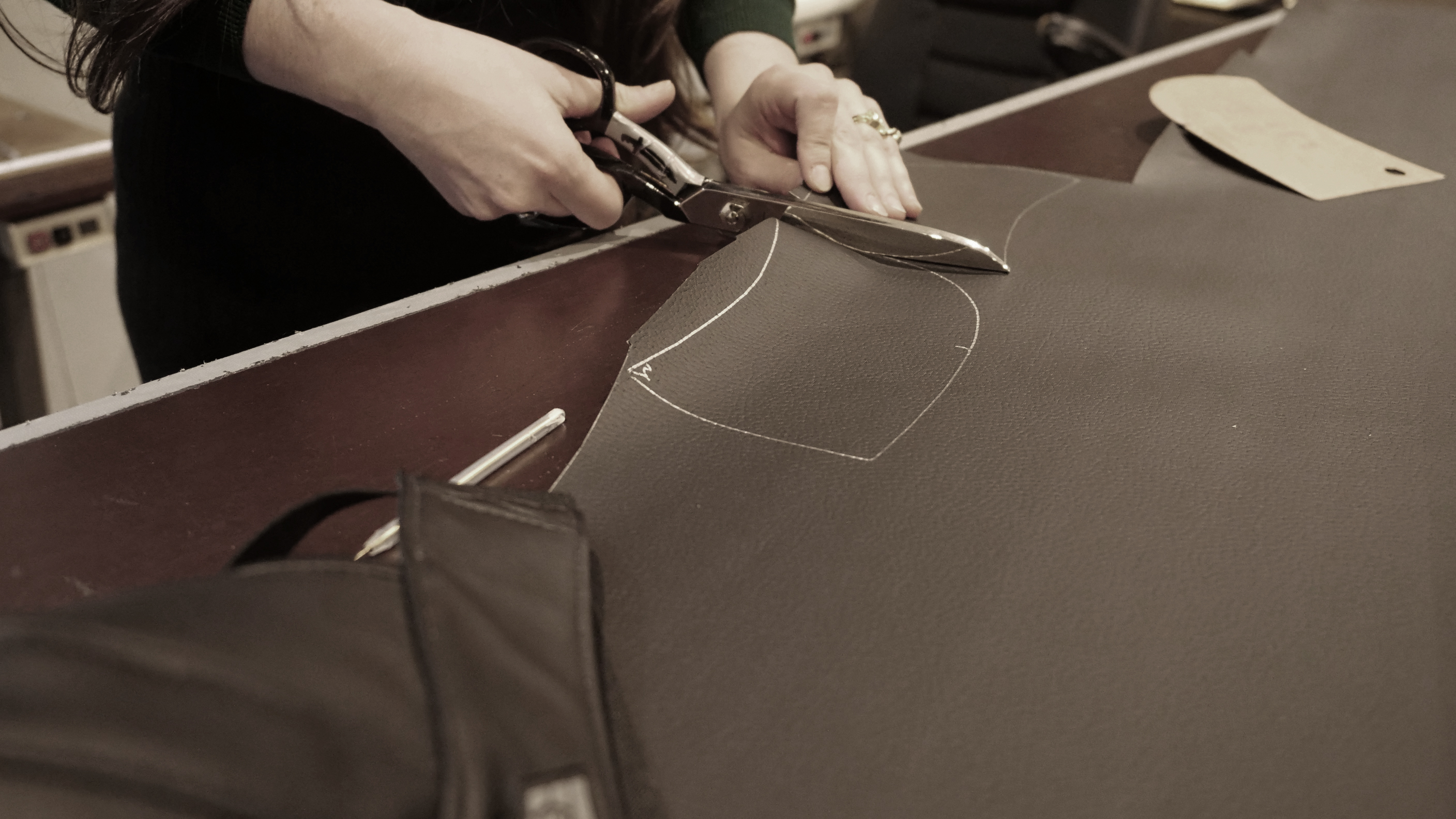 Cutting leather in Eagle's production house.